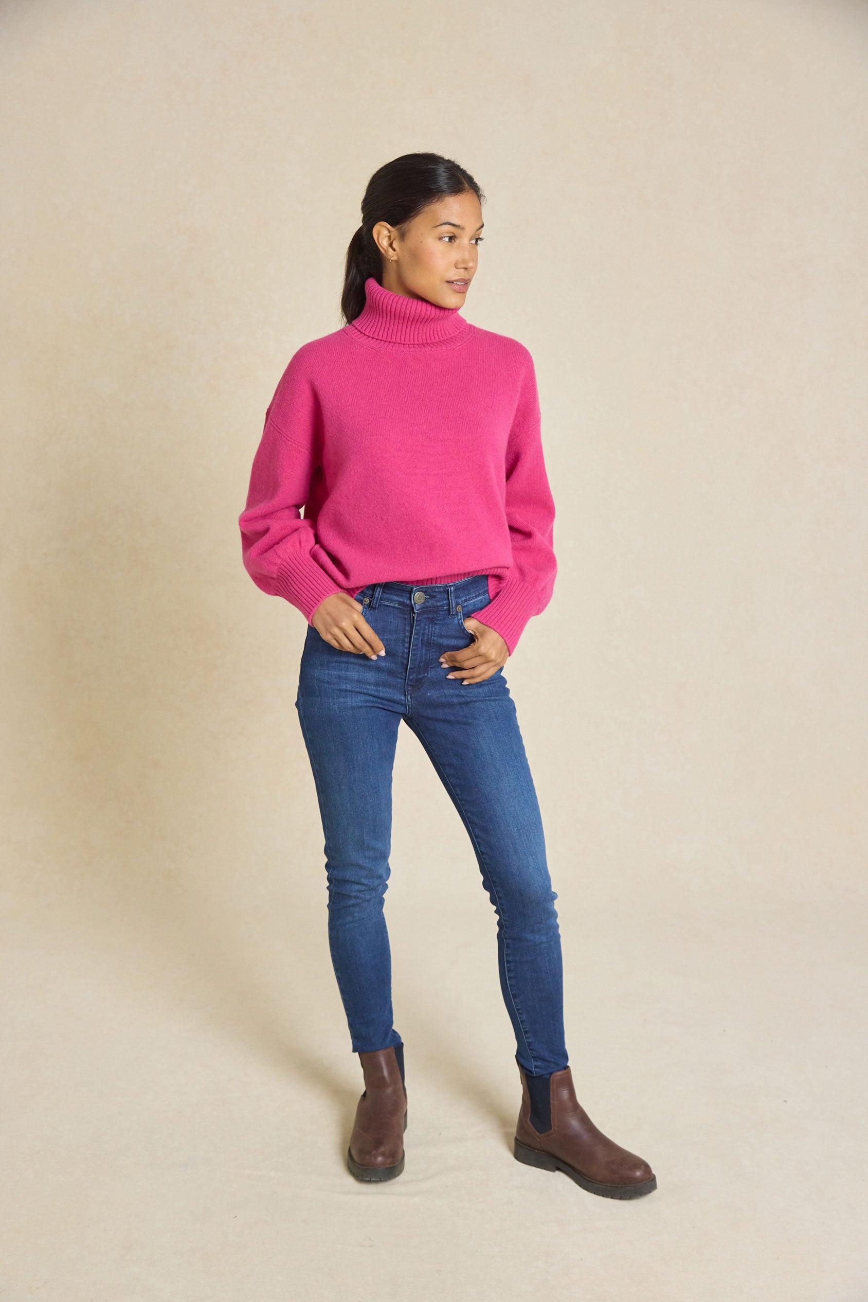 Embrace warmth this Autumn/Winter with our Hoverton Raspberry Roll Neck Jumper. Featuring ribbed cuffs, hem, and neck for ultimate comfort and style. Perfect for any occasion!