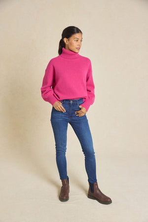 Embrace warmth this Autumn/Winter with our Hoverton Raspberry Roll Neck Jumper. Featuring ribbed cuffs, hem, and neck for ultimate comfort and style. Perfect for any occasion!