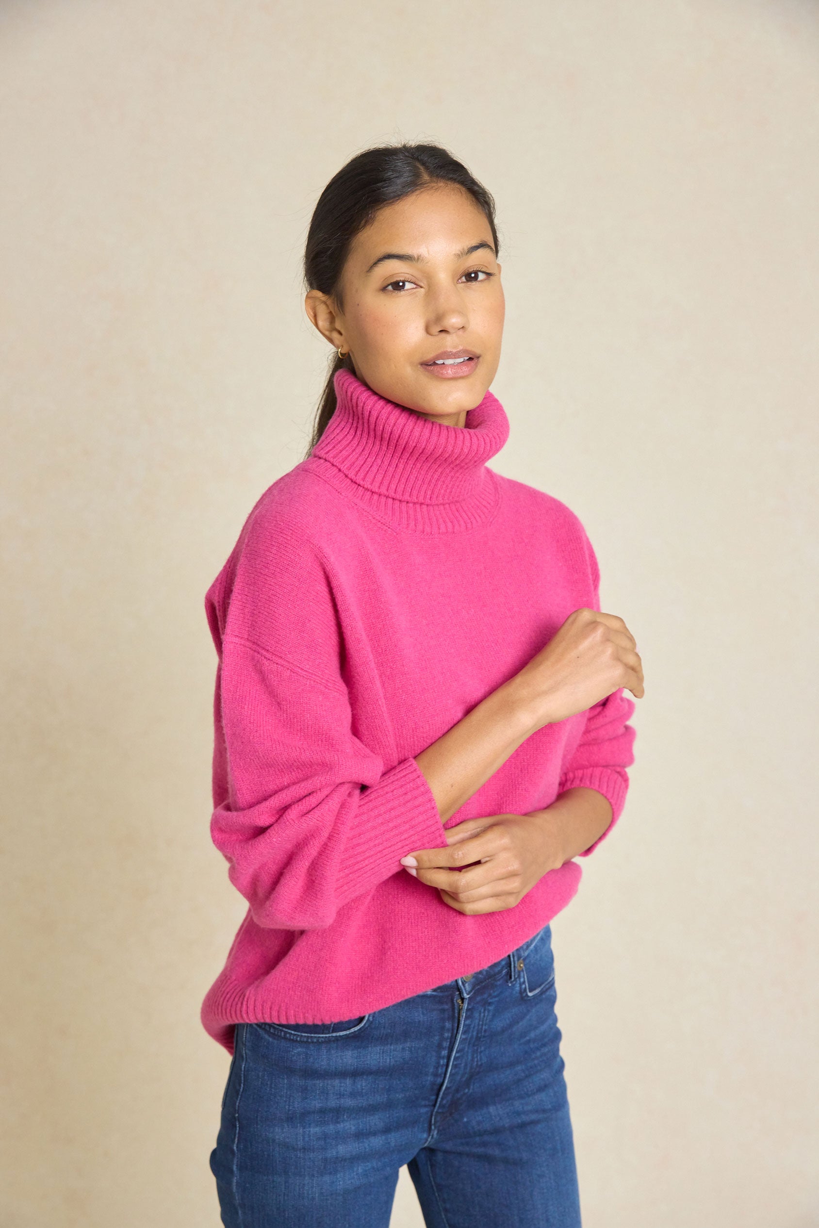 Embrace warmth this Autumn/Winter with our Hoverton Raspberry Roll Neck Jumper. Featuring ribbed cuffs, hem, and neck for ultimate comfort and style. Perfect for any occasion!