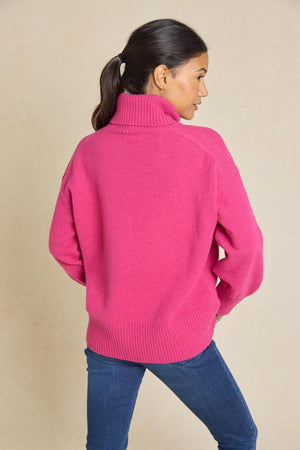 Embrace warmth this Autumn/Winter with our Hoverton Raspberry Roll Neck Jumper. Featuring ribbed cuffs, hem, and neck for ultimate comfort and style. Perfect for any occasion!