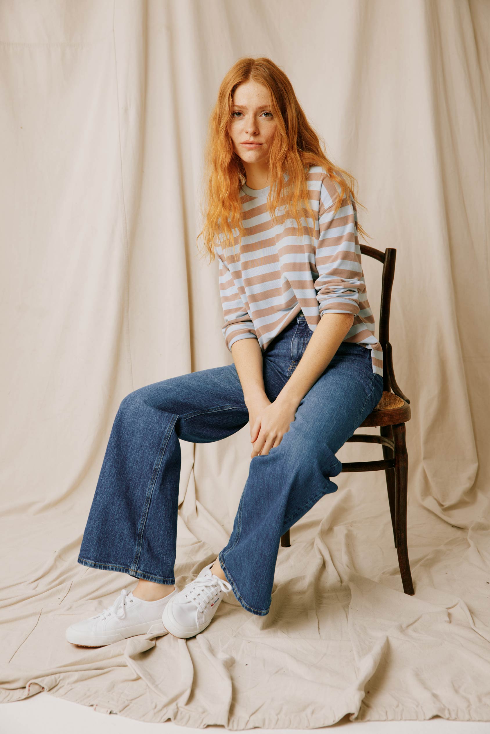 Upgrade your wardrobe with the Colemore Long Sleeve Tee. Crafted for comfort and style, this tee features a chic stripe pattern in sky blue, perfect for any occasion.