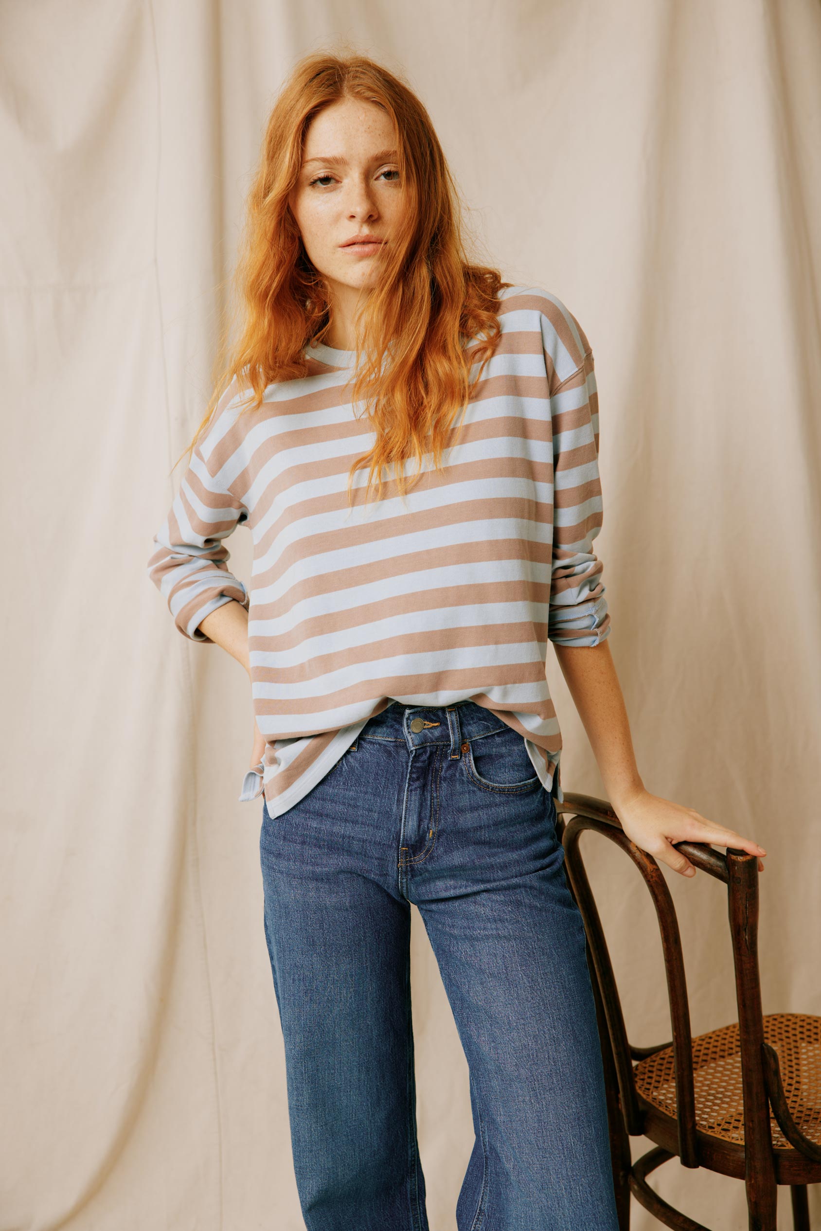 Upgrade your wardrobe with the Colemore Long Sleeve Tee. Crafted for comfort and style, this tee features a chic stripe pattern in sky blue, perfect for any occasion.