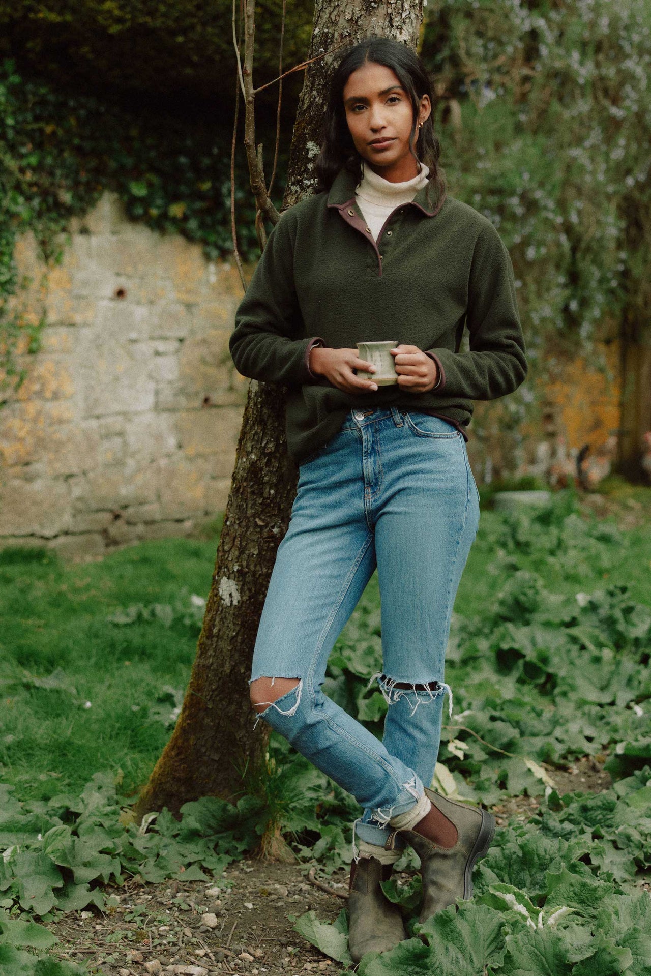 Discover the Covenham Khaki Half Button Sweat for women. Crafted from micro fleece with a collar, button placket and faux suede tipping - here style meets comfort effortlessly.