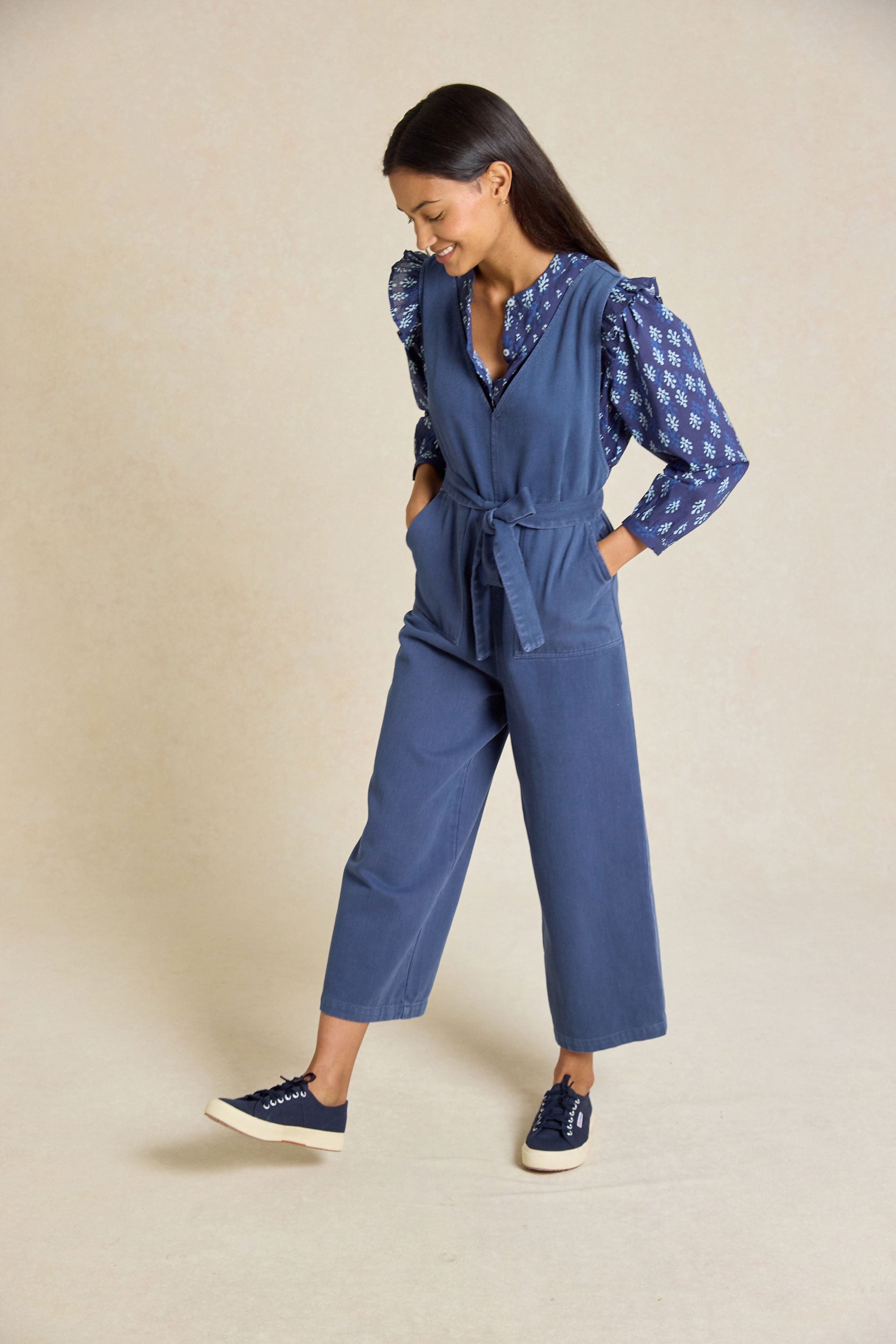 Embrace effortless style with the Darwell Navy Twill Jumpsuit. Featuring a flattering V-neck, tie waist and wide leg design, it's perfect for any occasion