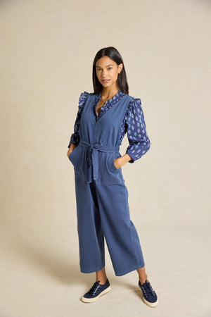 Embrace effortless style with the Darwell Navy Twill Jumpsuit. Featuring a flattering V-neck, tie waist and wide leg design, it's perfect for any occasion