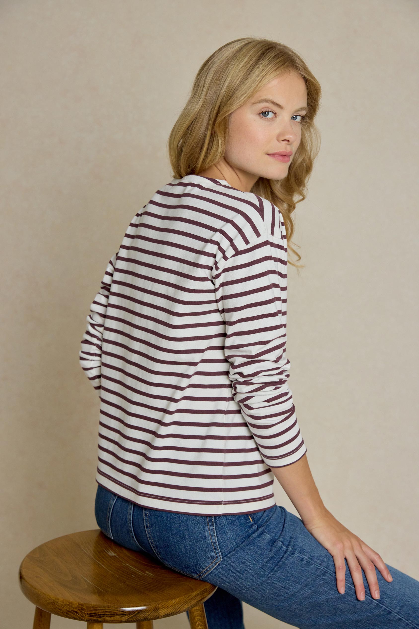 Upgrade your casual wardrobe with the Daventry Plum Stripe Henley Tee. This yarn-dyed, long-sleeve tee features a button placket and a peached finish for extra softness.