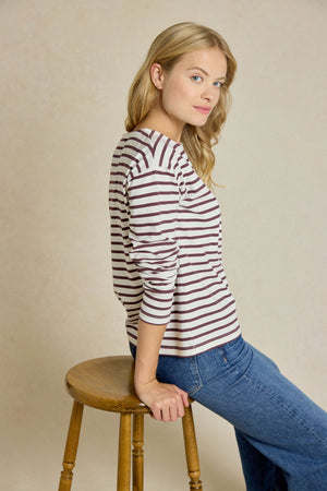 Upgrade your casual wardrobe with the Daventry Plum Stripe Henley Tee. This yarn-dyed, long-sleeve tee features a button placket and a peached finish for extra softness.