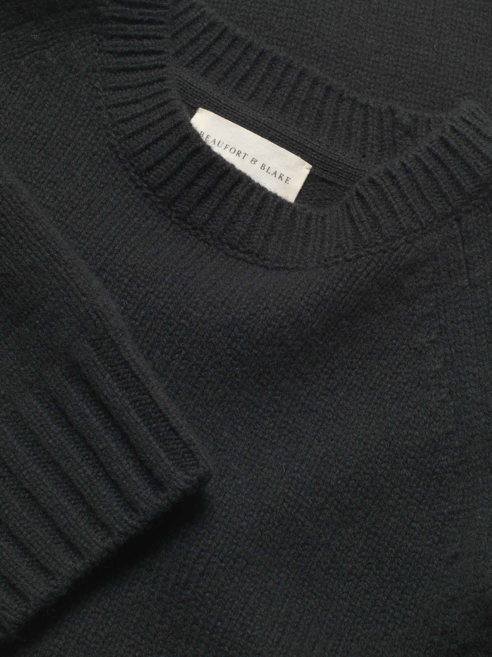 Stay warm and stylish with the Fernworthy Fisherman Rib Jumper. Crafted from 100% lambswool, this classic piece offers superior comfort and timeless design for any season.