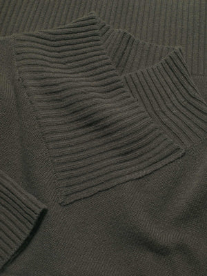 Stay cosy this Autumn/Winter with our Fonthill Khaki Wrap Neck Jumper. Featuring a stylish wrap neck and rolled cuffs, it's the perfect blend of comfort and elegance.