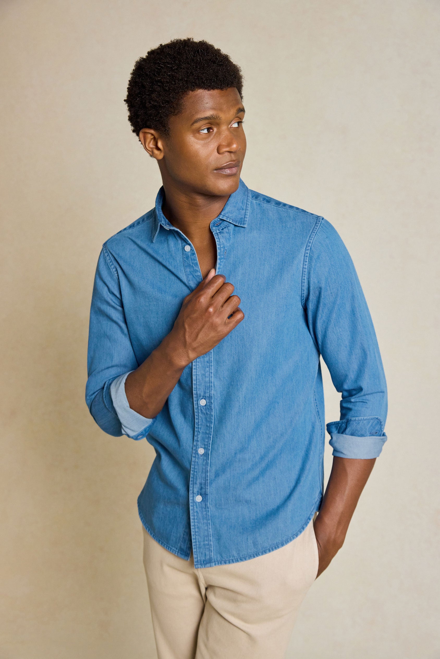 Enhance your casual wardrobe with the Kinver Mid Wash Denim Shirt. A versatile menswear essential, this shirt offers the perfect blend of comfort and style.