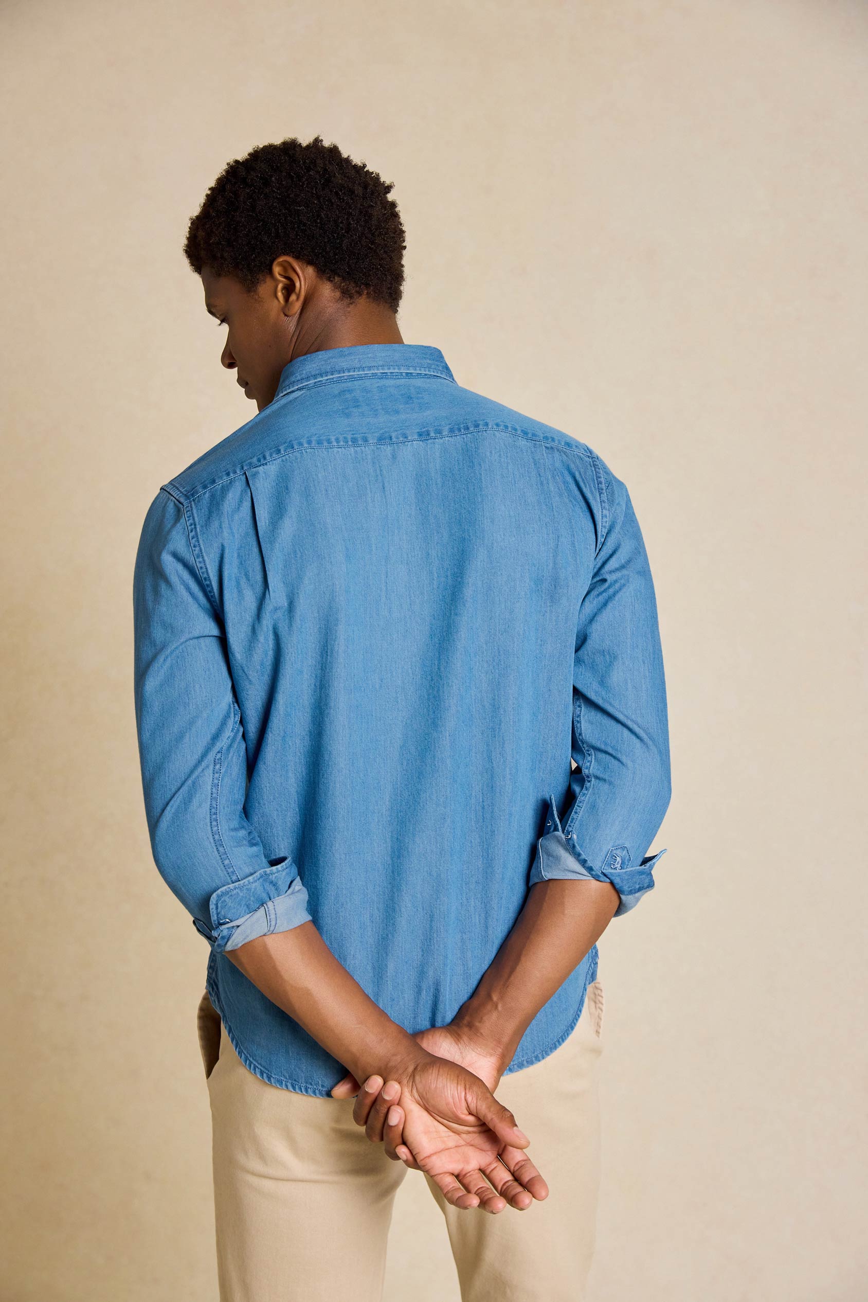 Enhance your casual wardrobe with the Kinver Mid Wash Denim Shirt. A versatile menswear essential, this shirt offers the perfect blend of comfort and style.