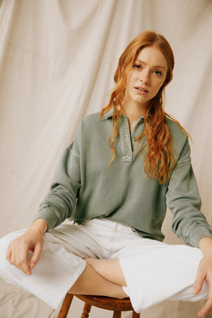 Introducing the stylish Kitcliffe Khaki Half Button sweatshirt for women. Comfortable, versatile, and perfect for casual wear. Elevate your wardrobe with this must-have piece!