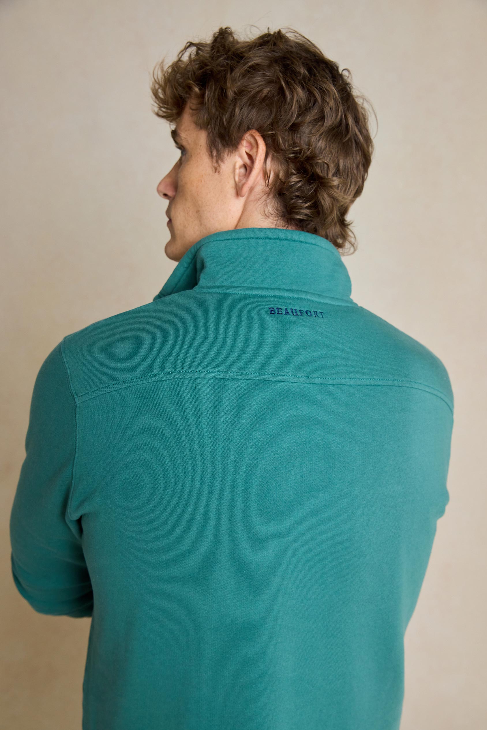 Upgrade your casual wardrobe with the Laurieston Emerald Half Zip Sweat. This versatile piece combines comfort and style, featuring a half zip design, ideal for everyday wear.