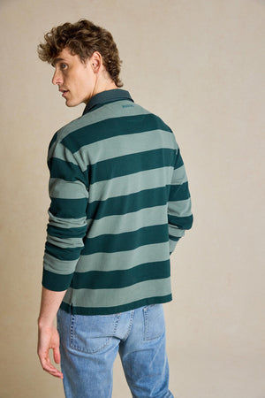 Elevate your casual look with the Mabie Forest Green Stripe Rugby. Made from 100% cotton, this classic men's rugby shirt offers comfort and timeless style for any occasion.