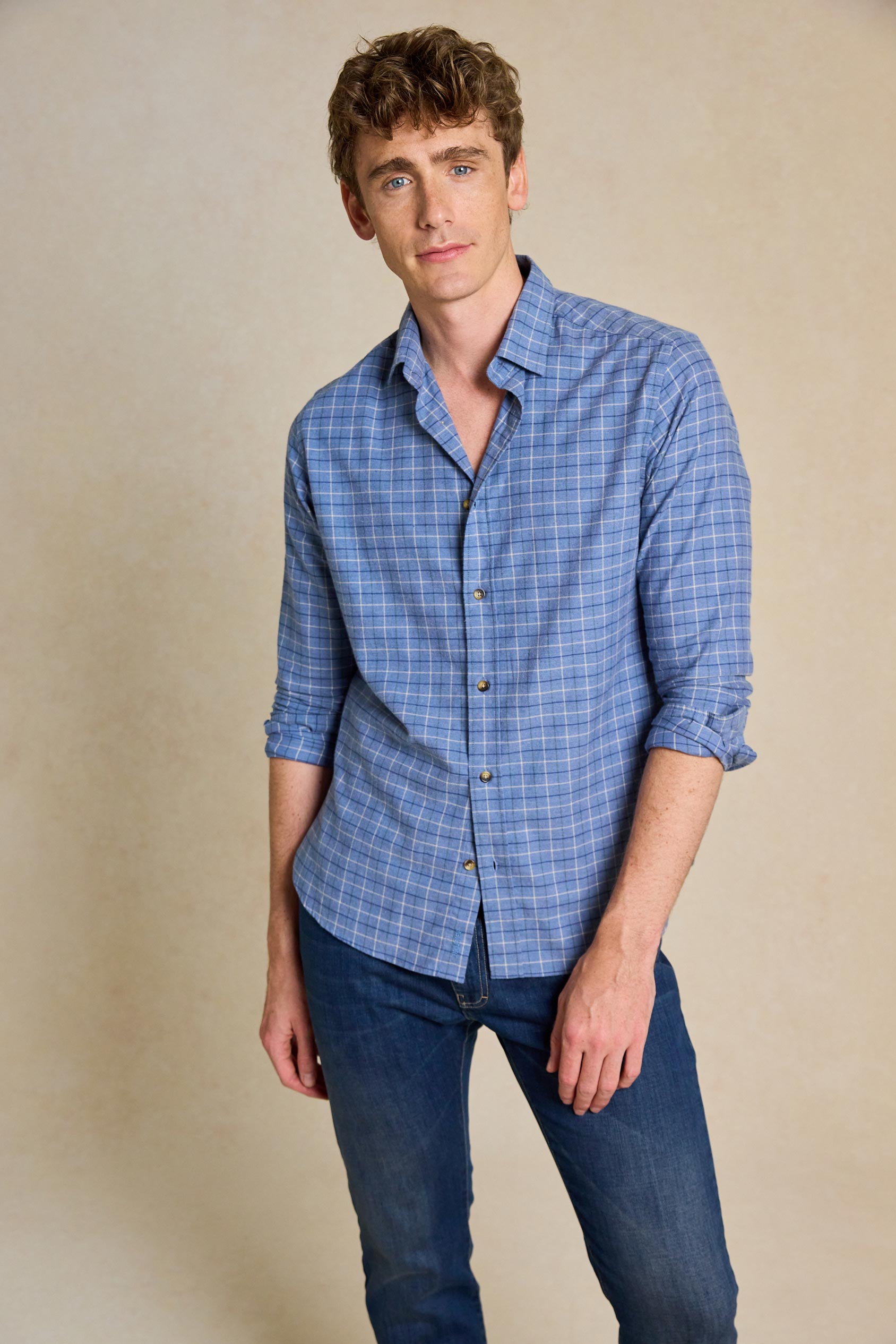 Enhance your look with the Marston Denim Blue Check Shirt. Made from 100% cotton and featuring a classic collar, this shirt combines comfort with timeless style.