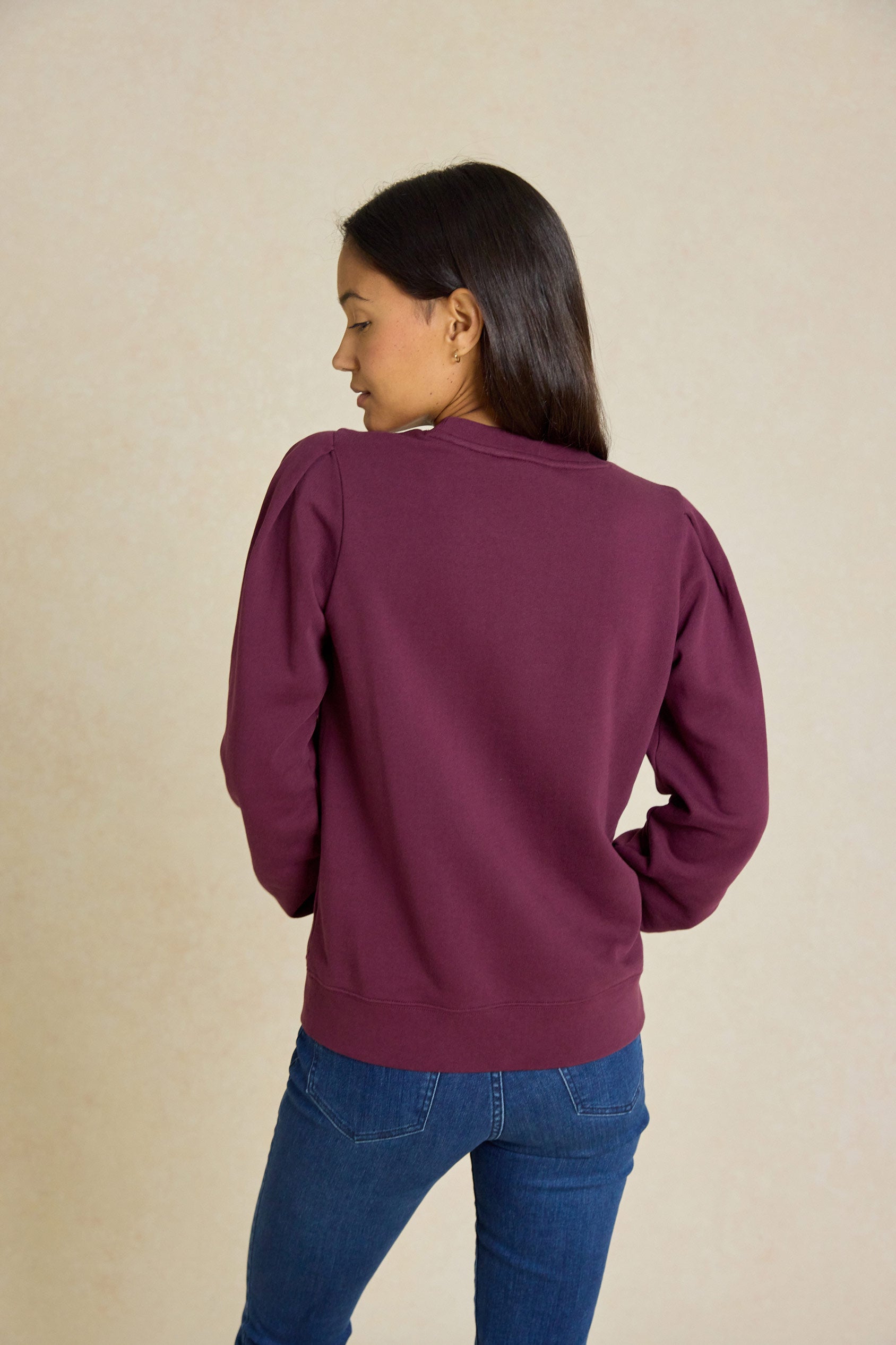 Discover the perfect blend of comfort and style with our Olton Plum Sweatshirt. This garment dyed sweat features subtle puff sleeves for a casual, modern look.