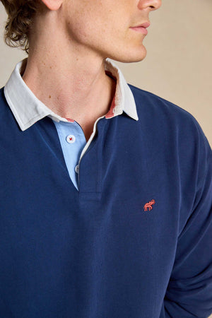 Upgrade your casual wardrobe with the Penninghame Navy Rugby. Featuring a soft peached finish and chambray details, this rugby shirt combines comfort with refined style.