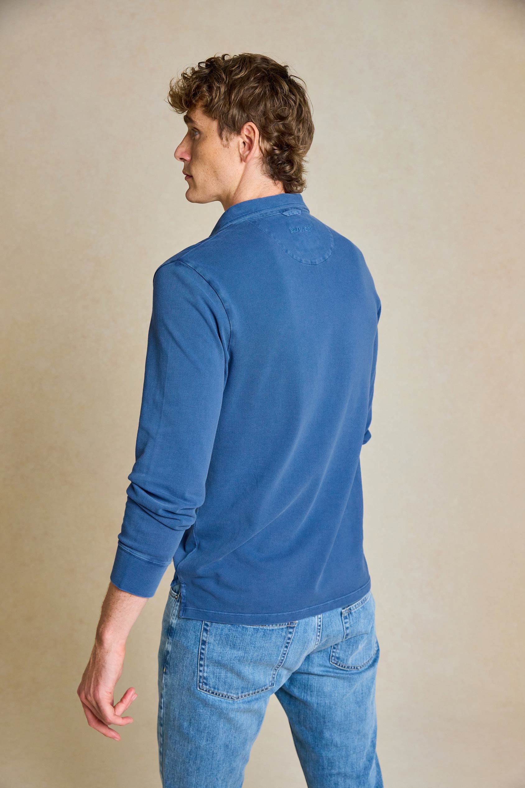 Enhance your wardrobe with the Rye Denim Blue Long Sleeve Polo. This versatile piece offers the perfect blend of casual style and comfort, ideal for any occasion.