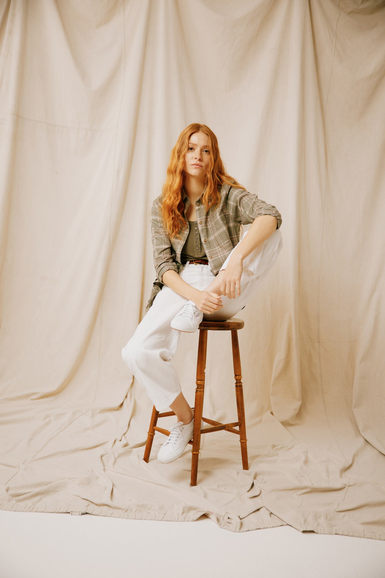 " Elevate your style with our Sandhill Khaki Check Shirt for women—classic, chic, and versatile for any occasion. Perfect for layering or standalone wear."