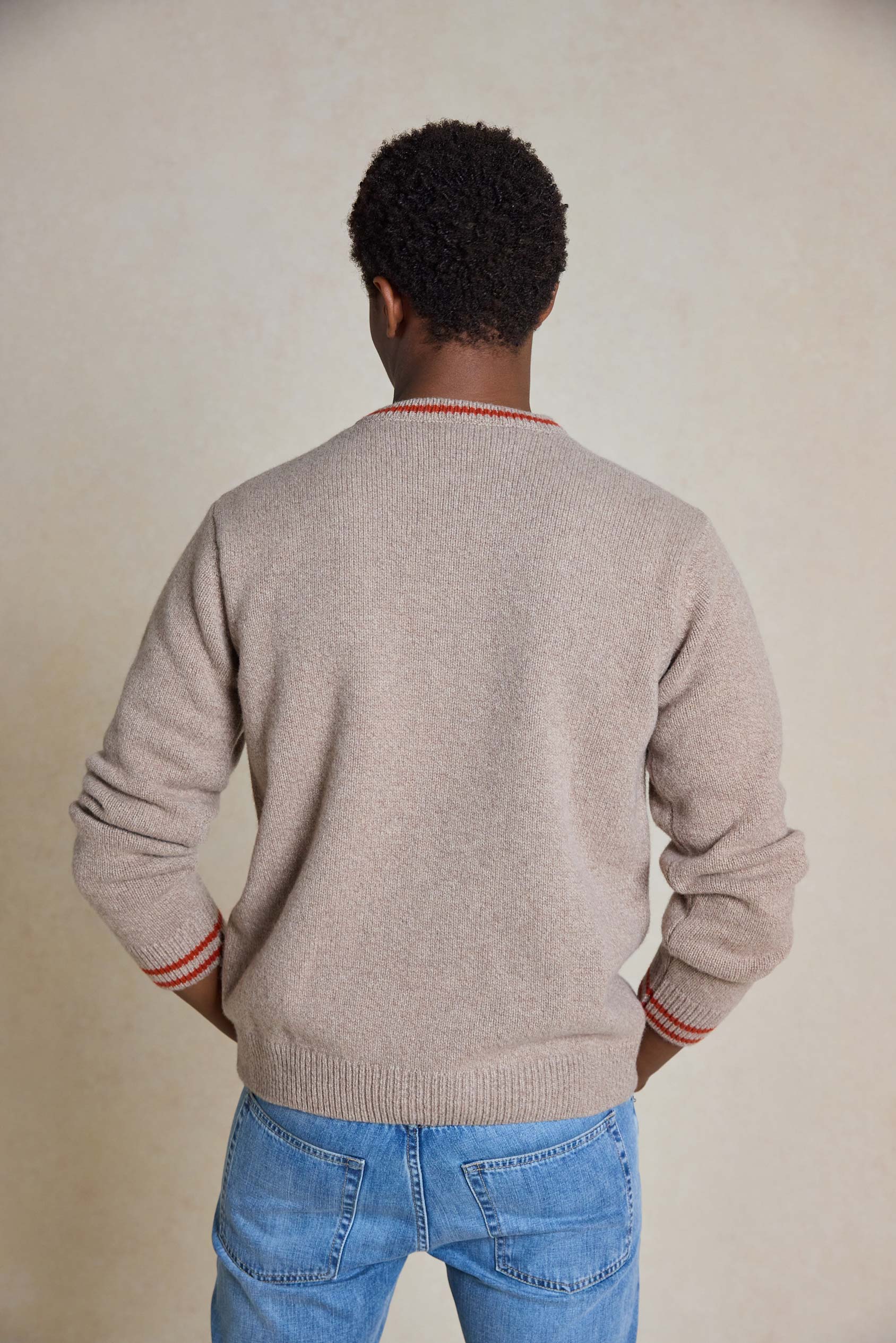 Upgrade your style with the Selwood Oat Crew Jumper. This versatile menswear essential offers a perfect blend of comfort and timeless appeal, ideal for any occasion.