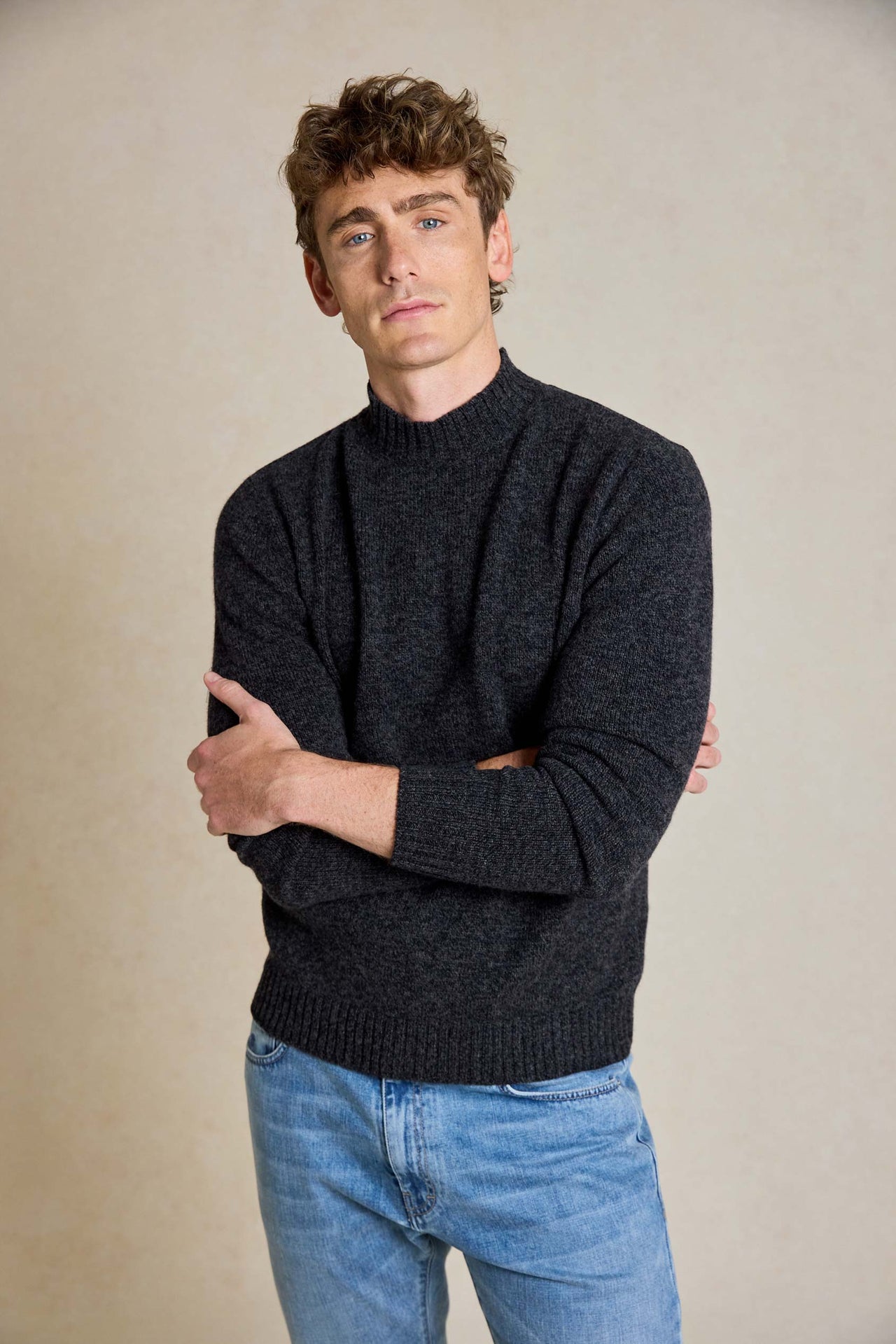 Enhance your look with the Savernake Charcoal Mock Neck Jumper. This versatile piece combines warmth and style and features a mock neck design for modern style.