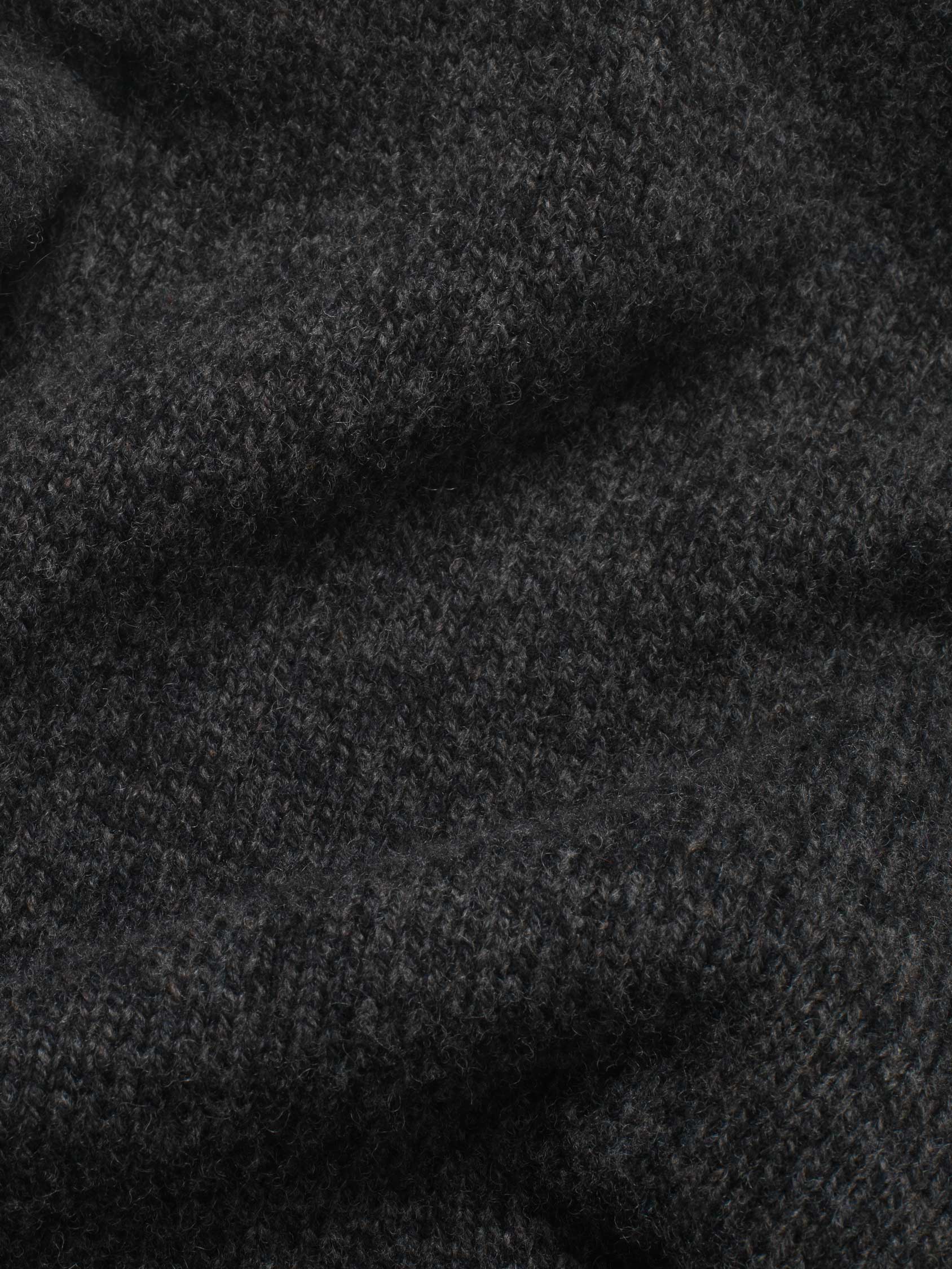 Enhance your look with the Savernake Charcoal Mock Neck Jumper. This versatile piece combines warmth and style and features a mock neck design for modern style.