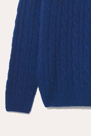 Shop our Shaggy Cobalt Cable Jumper. Made from super soft wool, this cable knit jumper is brushed for a vintage look, combining comfort with effortless style.