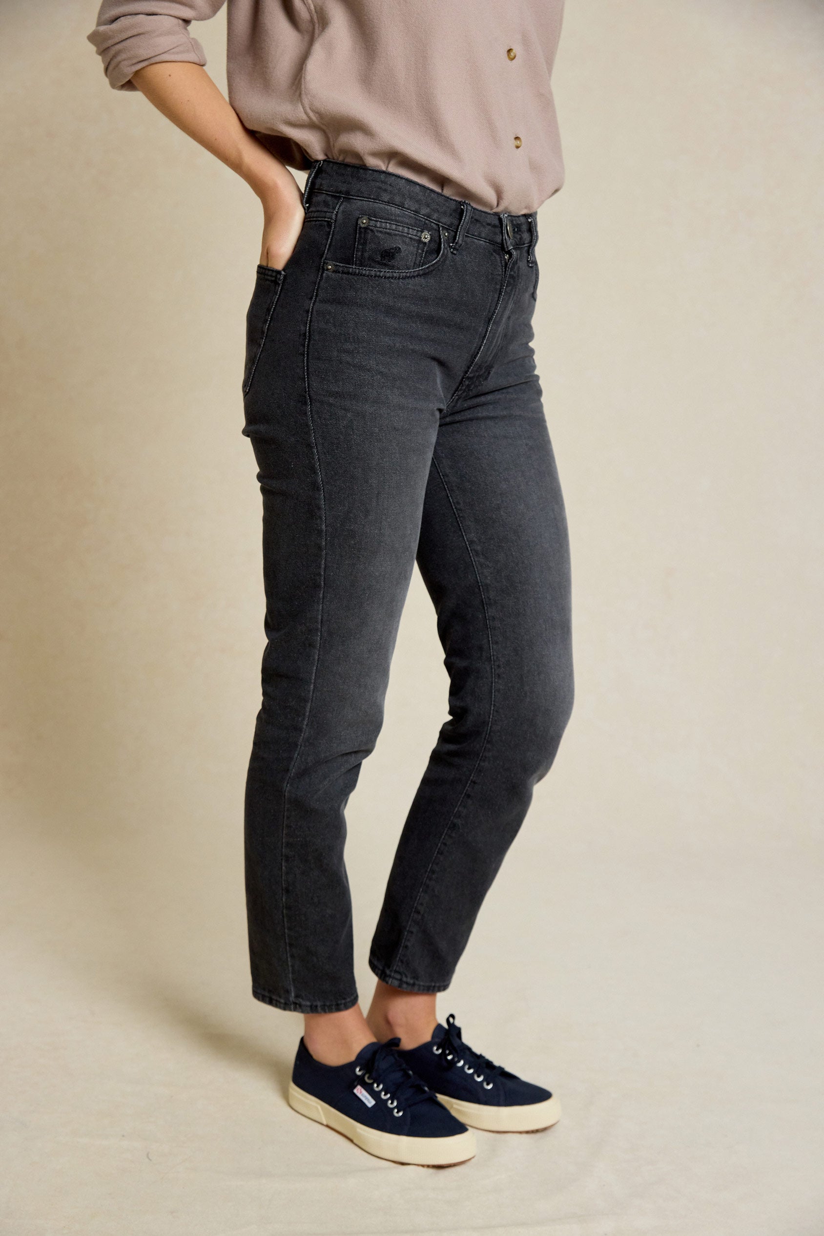 100% cotton non-stretch denim charcoal mom jeans. High waisted slim tapered ankle length leg. Machine wash casualwear made in Portugal. Size 6,8,10,12,14,16,18.