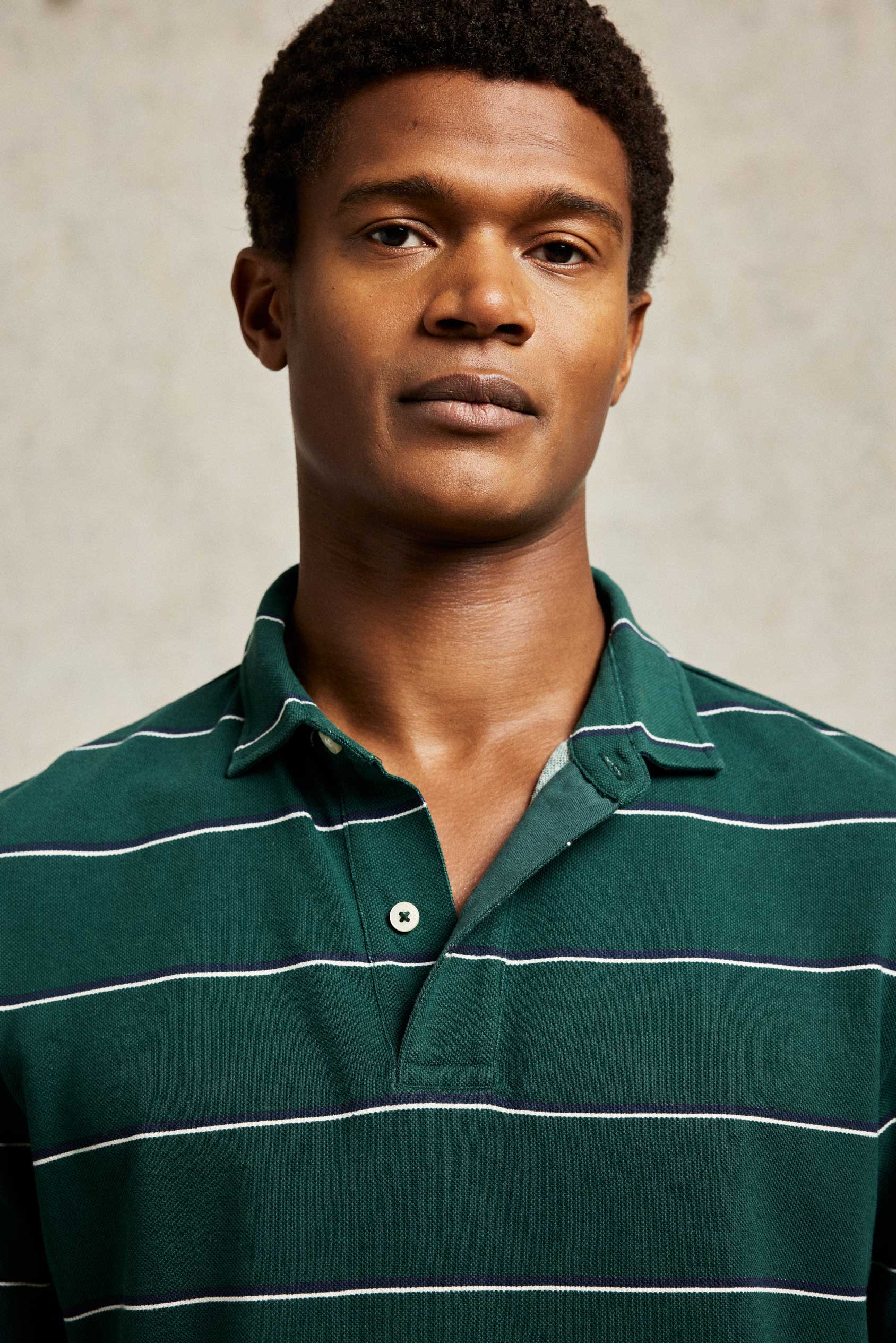 Green and white striped polo shirt best sale