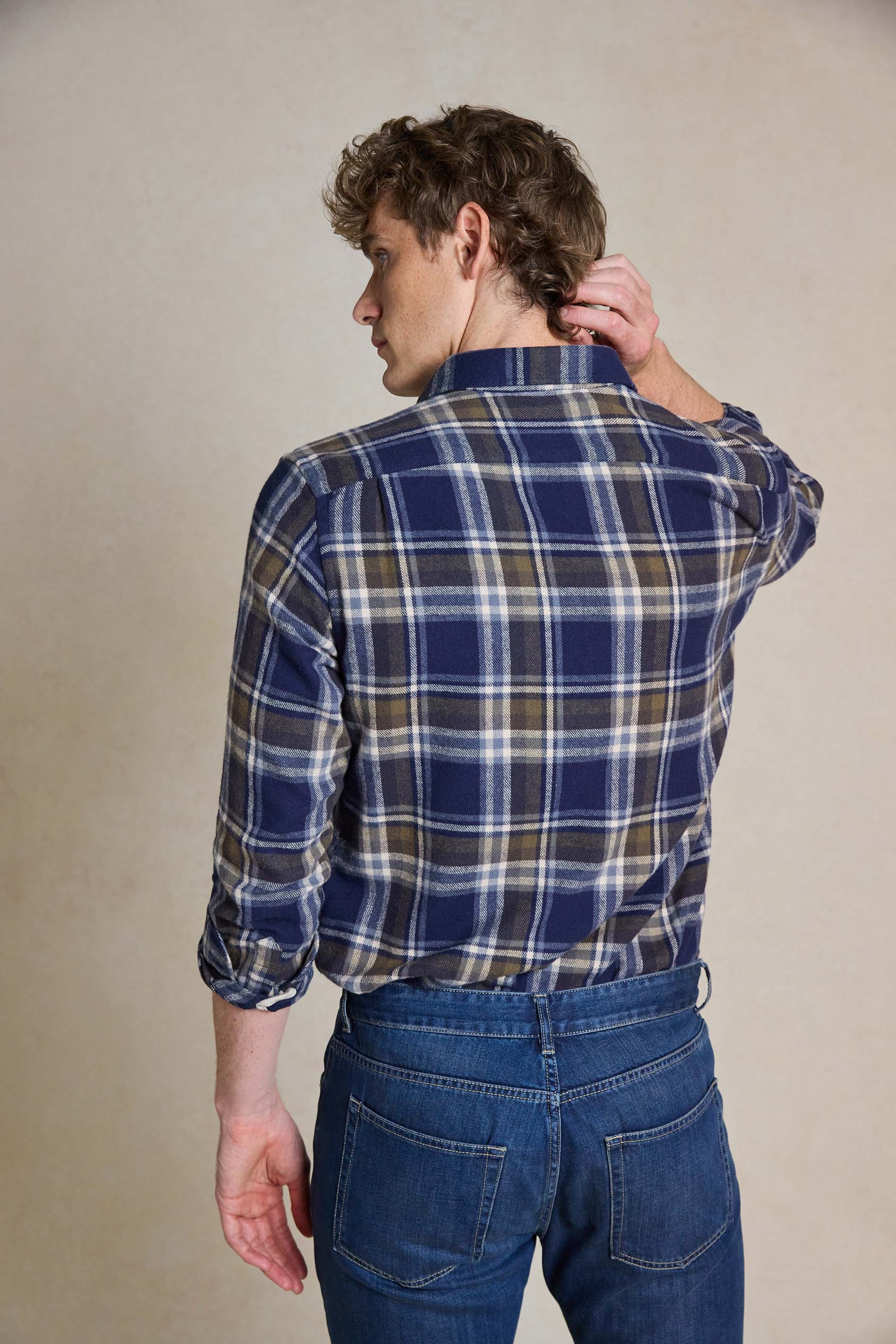 Refresh your wardrobe with the Thetford Navy Check Shirt. This versatile piece is 100% cotton and machine washable, combining classic style with easy care.