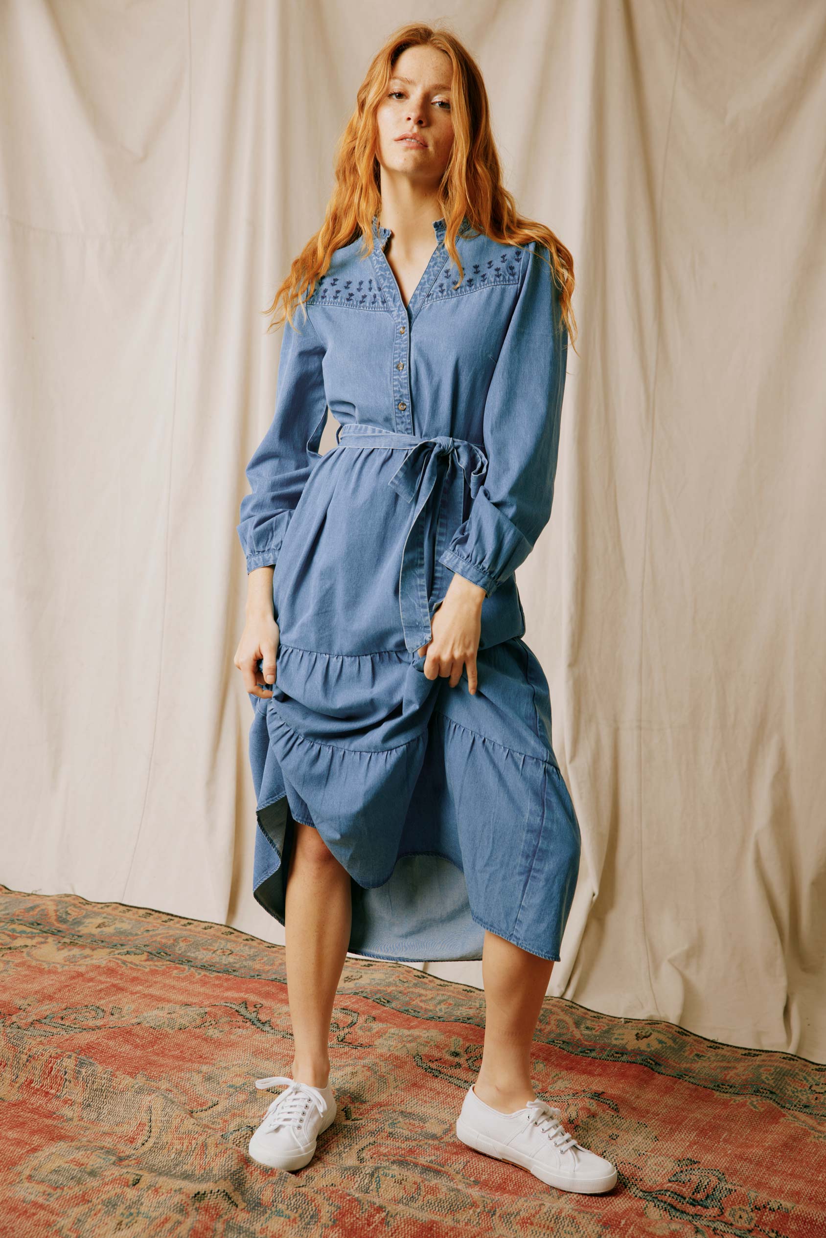 Elevate your wardrobe with the Walshaw Embroidered Denim Dress, a perfect blend of classic charm and modern elegance. Crafted from premium quality denim, it offers both durability and style.