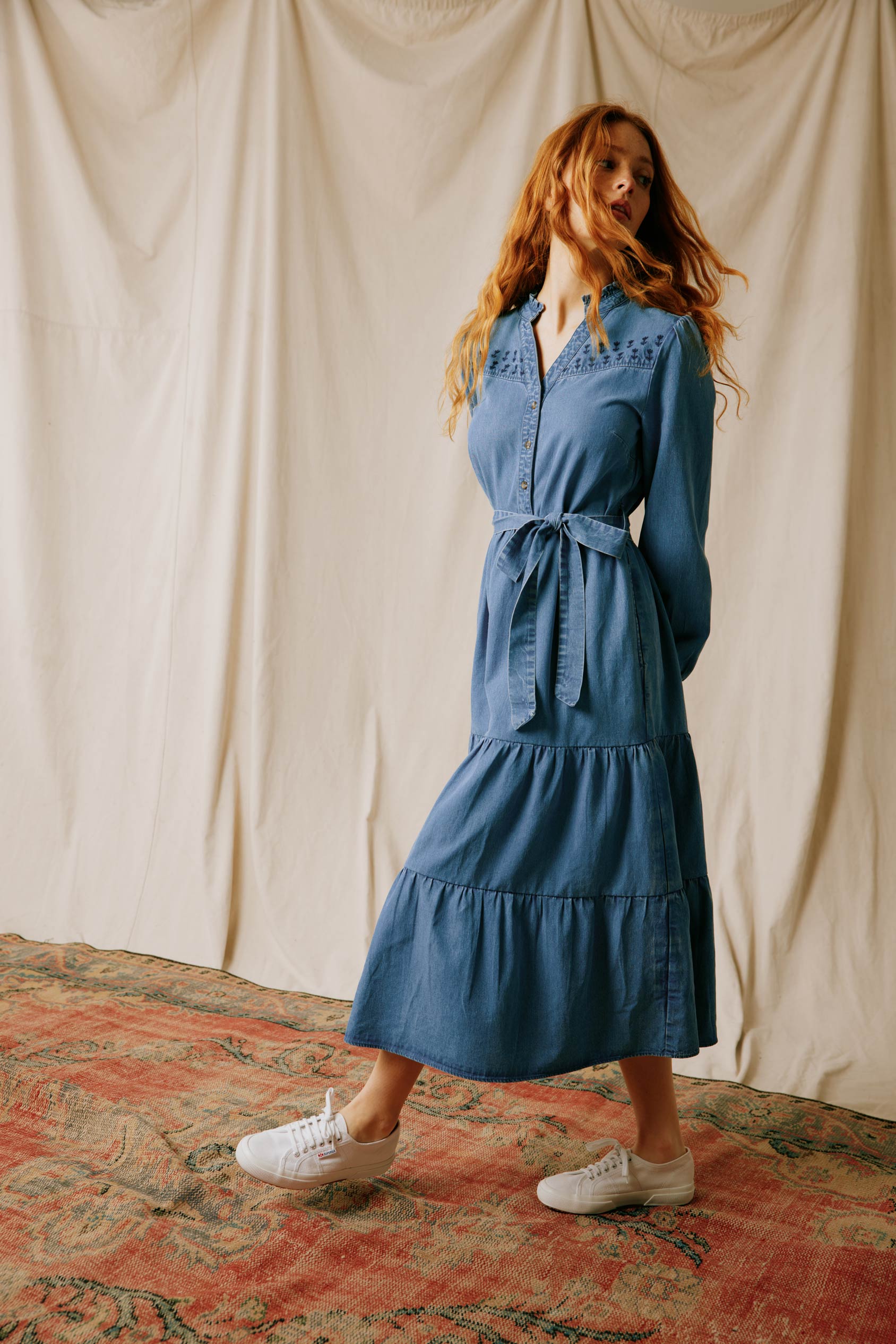 Elevate your wardrobe with the Walshaw Embroidered Denim Dress, a perfect blend of classic charm and modern elegance. Crafted from premium quality denim, it offers both durability and style.