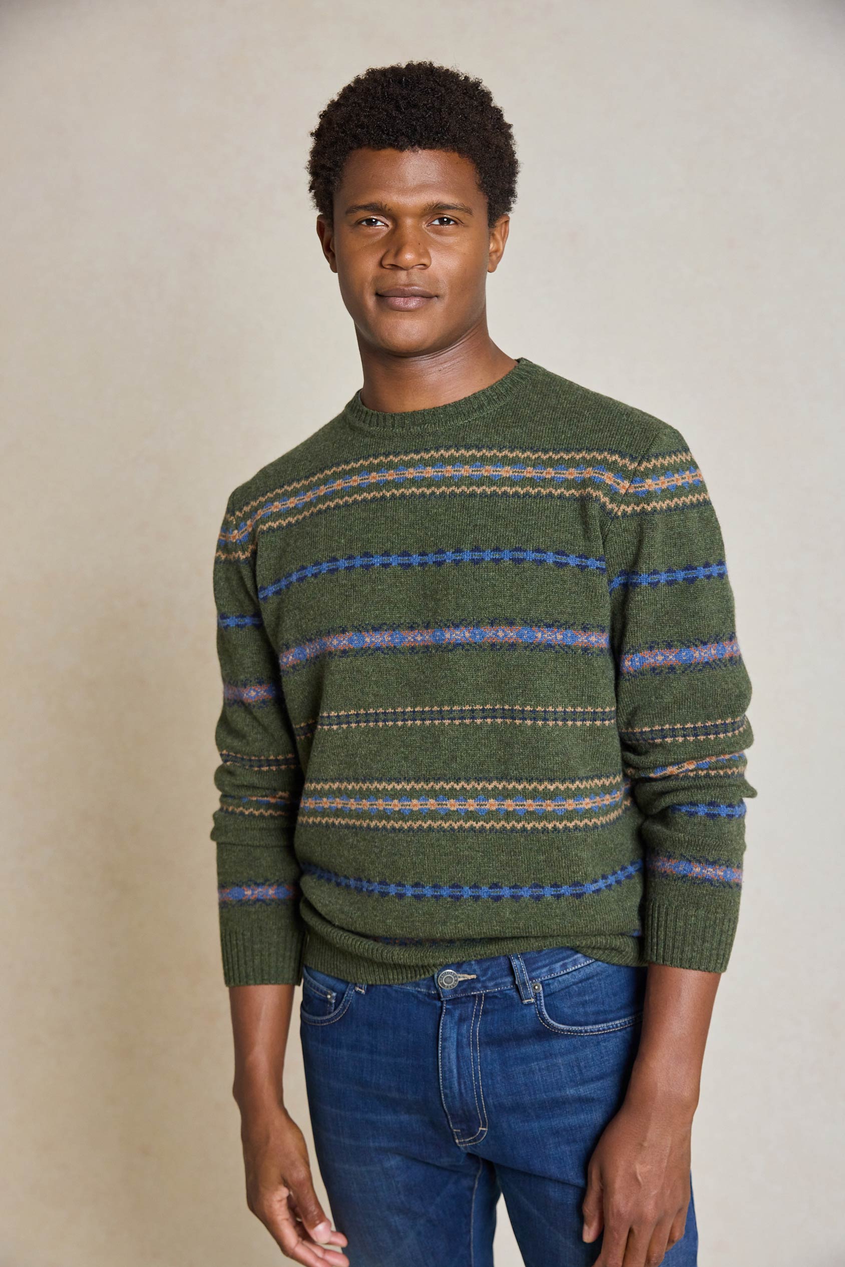 Upgrade your wardrobe with the Wareham Fair Crew Neck Jumper. Featuring a classic Fair Isle pattern, this cozy jumper blends timeless style with modern comfort.