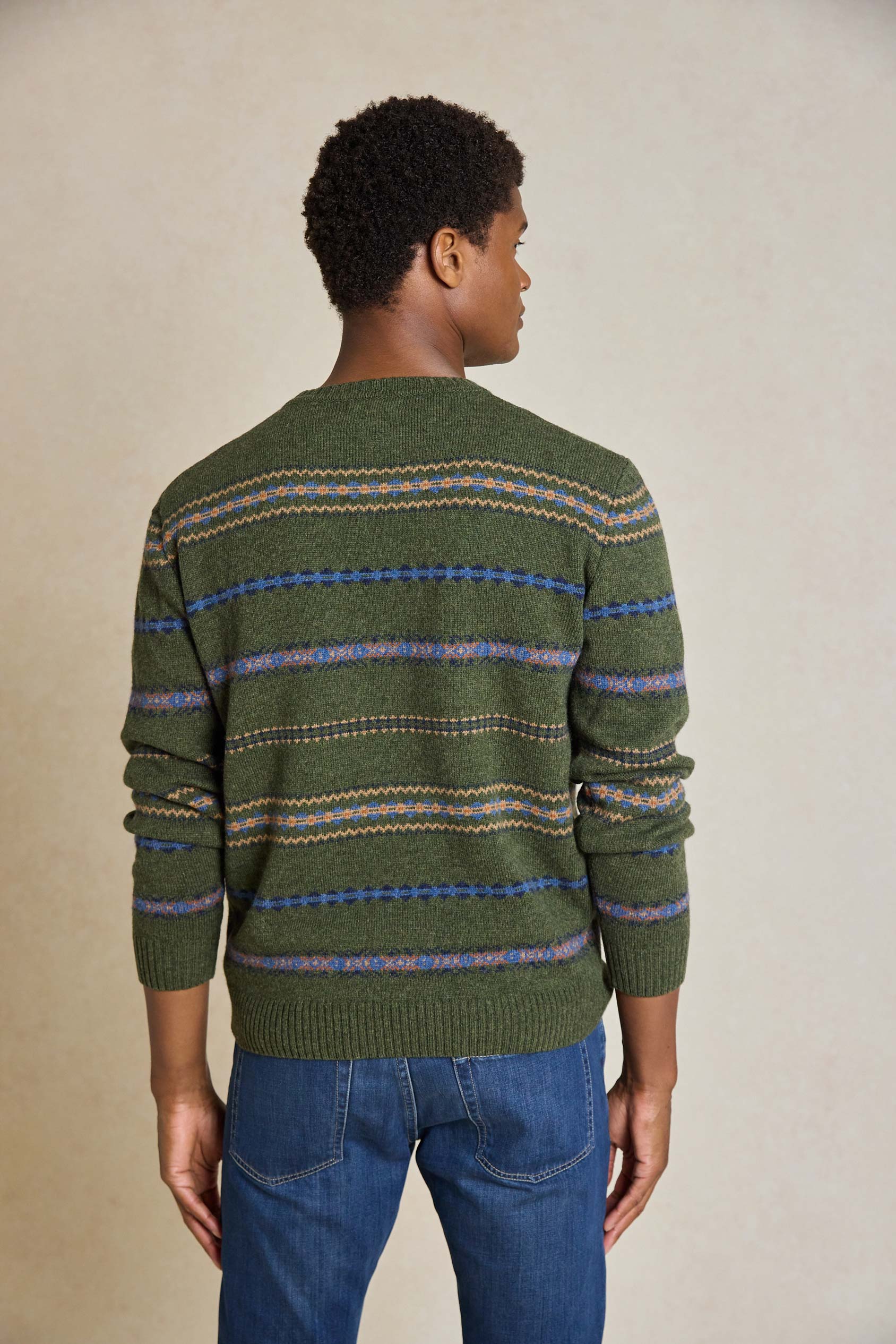 Upgrade your wardrobe with the Wareham Fair Crew Neck Jumper. Featuring a classic Fair Isle pattern, this cozy jumper blends timeless style with modern comfort.