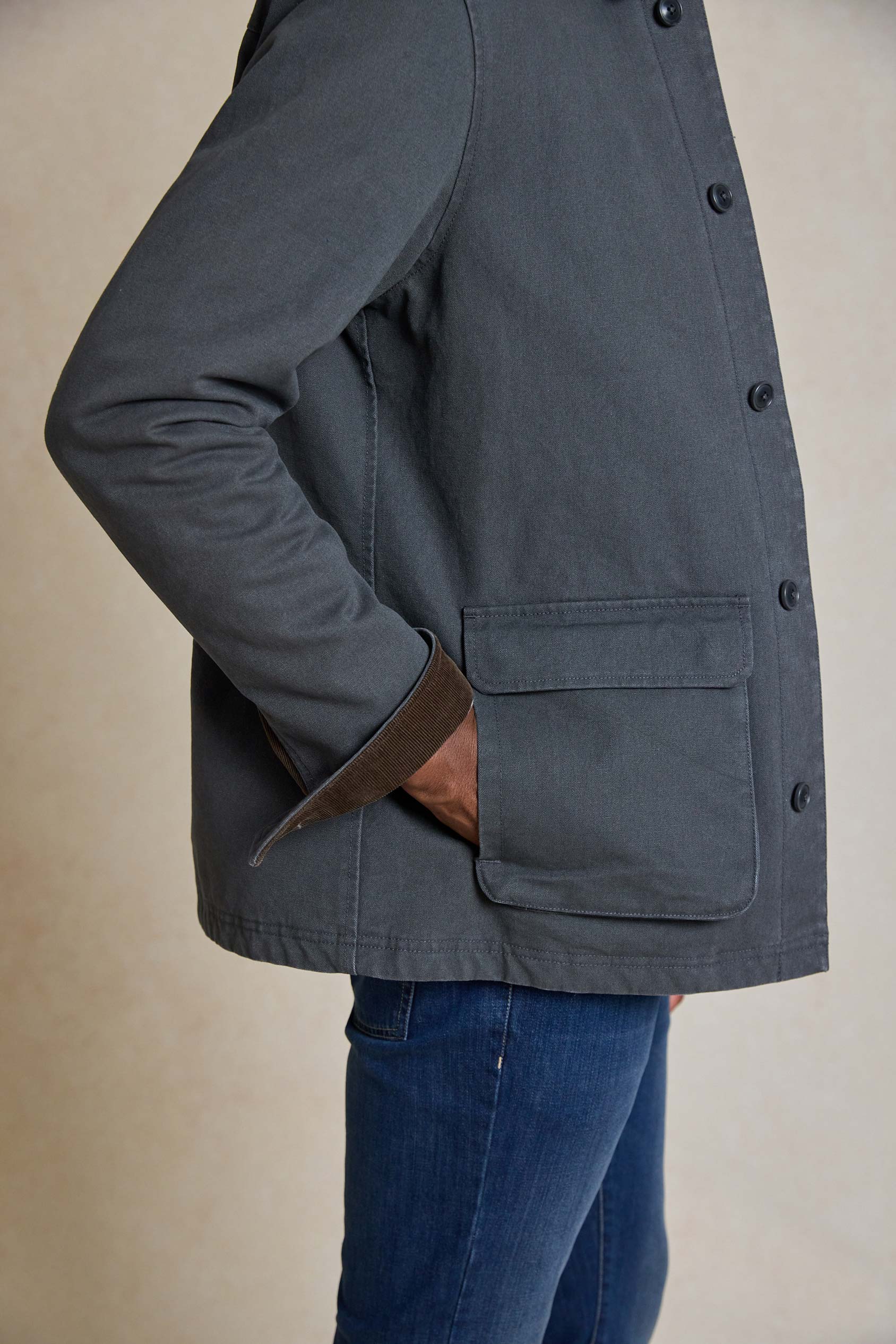 Upgrade your style with the Whinfell Charcoal Barn Coat. This menswear essential combines rugged durability with timeless design, perfect for any season.