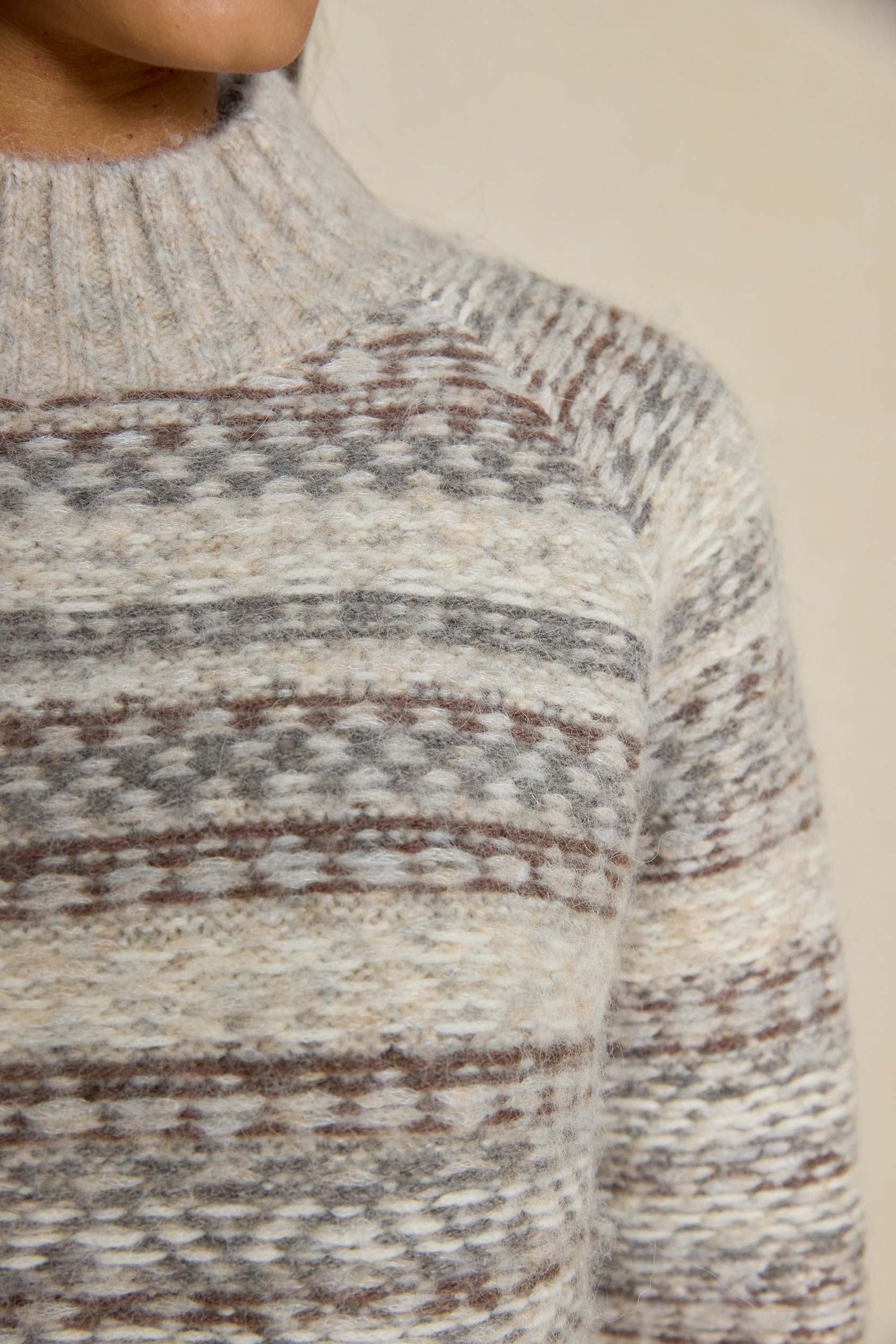 Stay cosy this Autumn/Winter in our Winford Reverse Fair Isle Knitted Jumper. Featuring a stylish mock neck and unique reverse design for ultimate style and warmth.